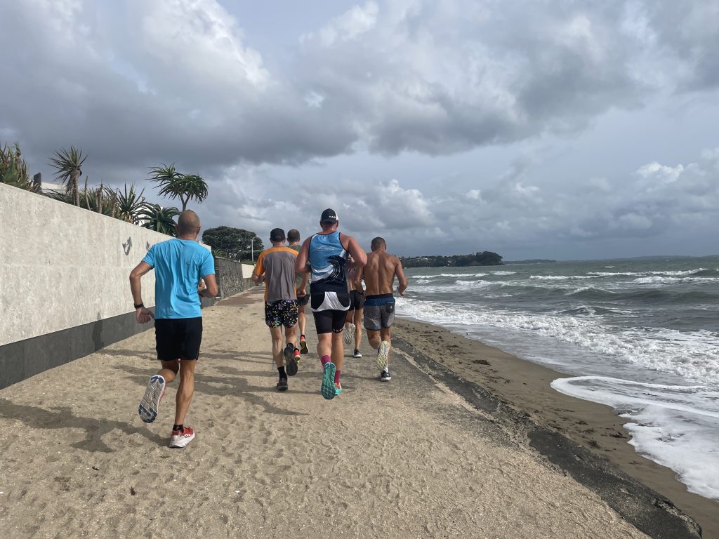 a run by the beach as stormy skies form