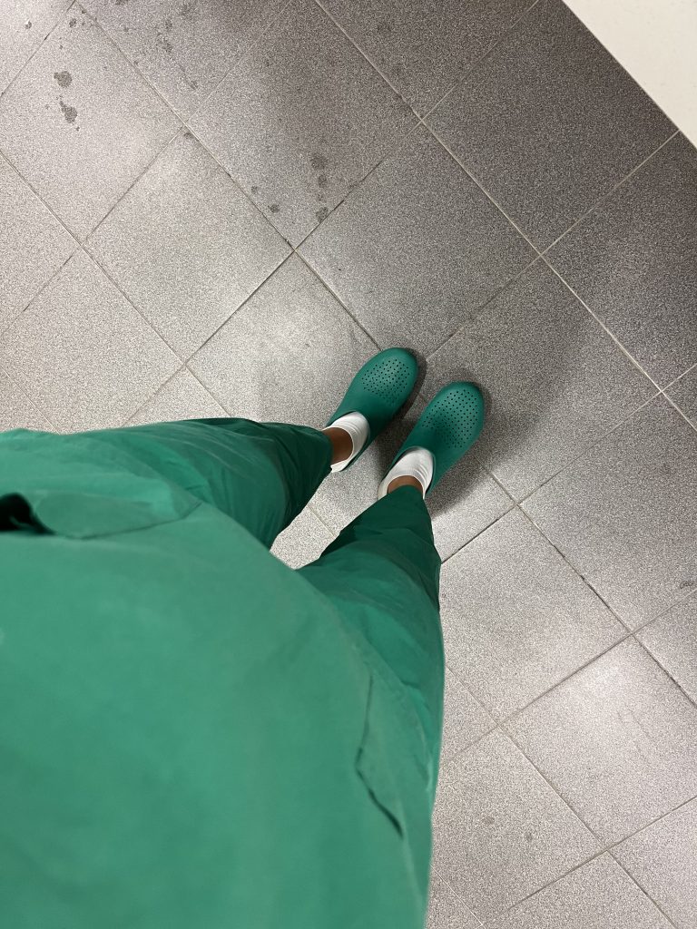 Green scrubs and green surgery shoes