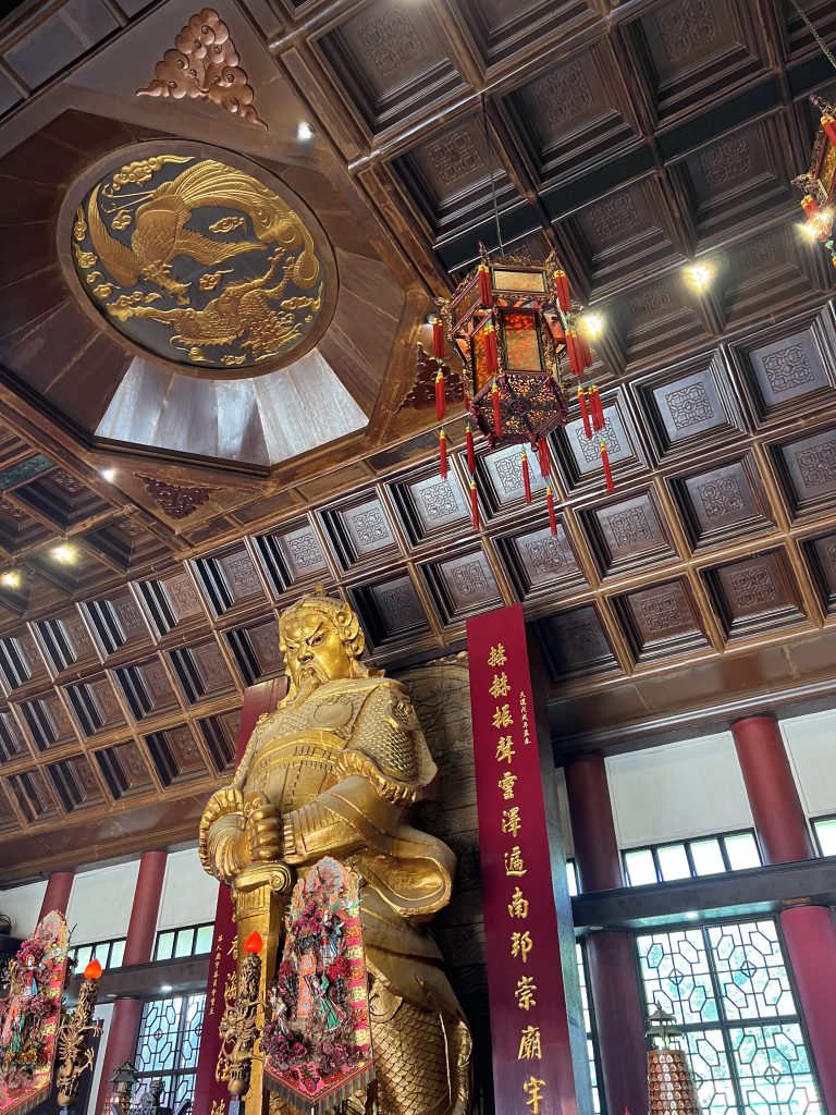 Gold statue in Che Kung Temple