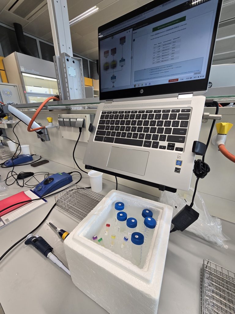 photo of a lab bench with a laptop