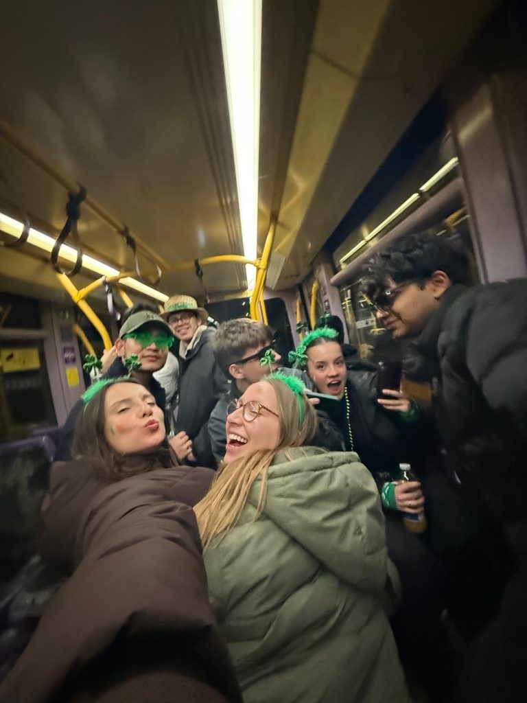 Friends on the tram on the way to the city